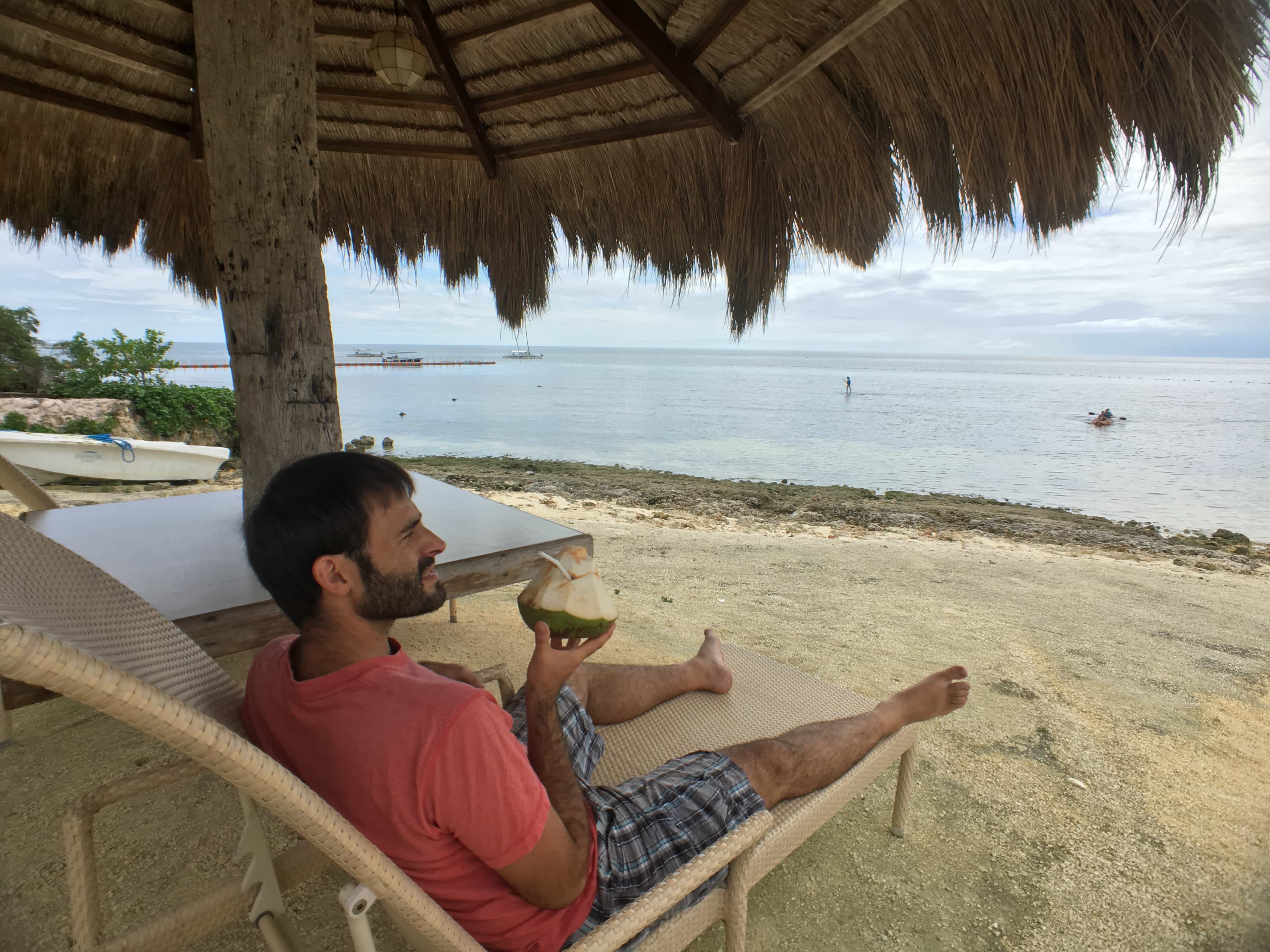 Panglao tourist spots, daily budget to visit Panglao, Visit Panglao: Relaxing having a coconut