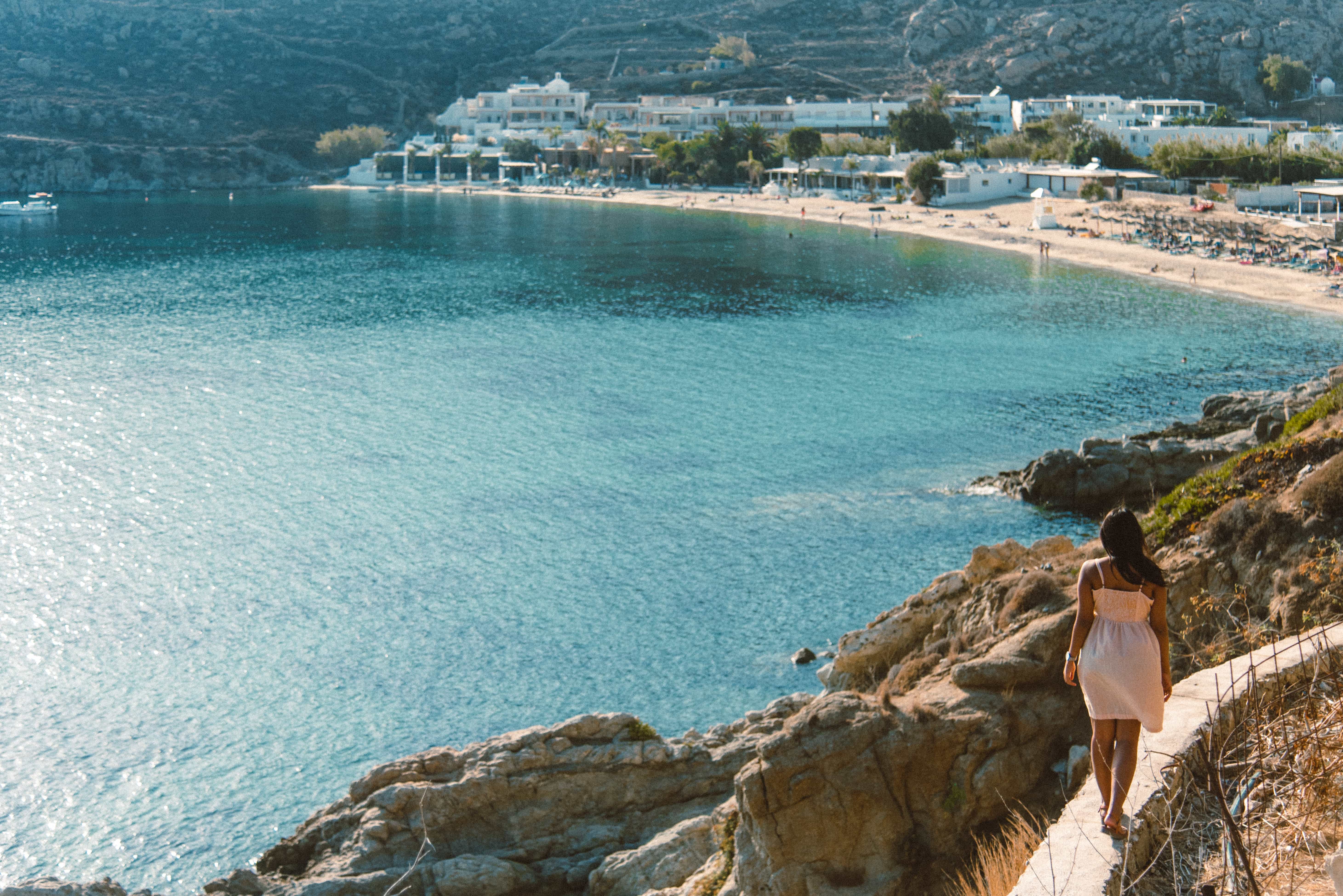 22 Amazing Things to do in Mykonos (Travel Guide) 27 Things to do in Mykonos, Places to visit in Mykonos, Food to try in Mykonos, psarou beach in mykonos