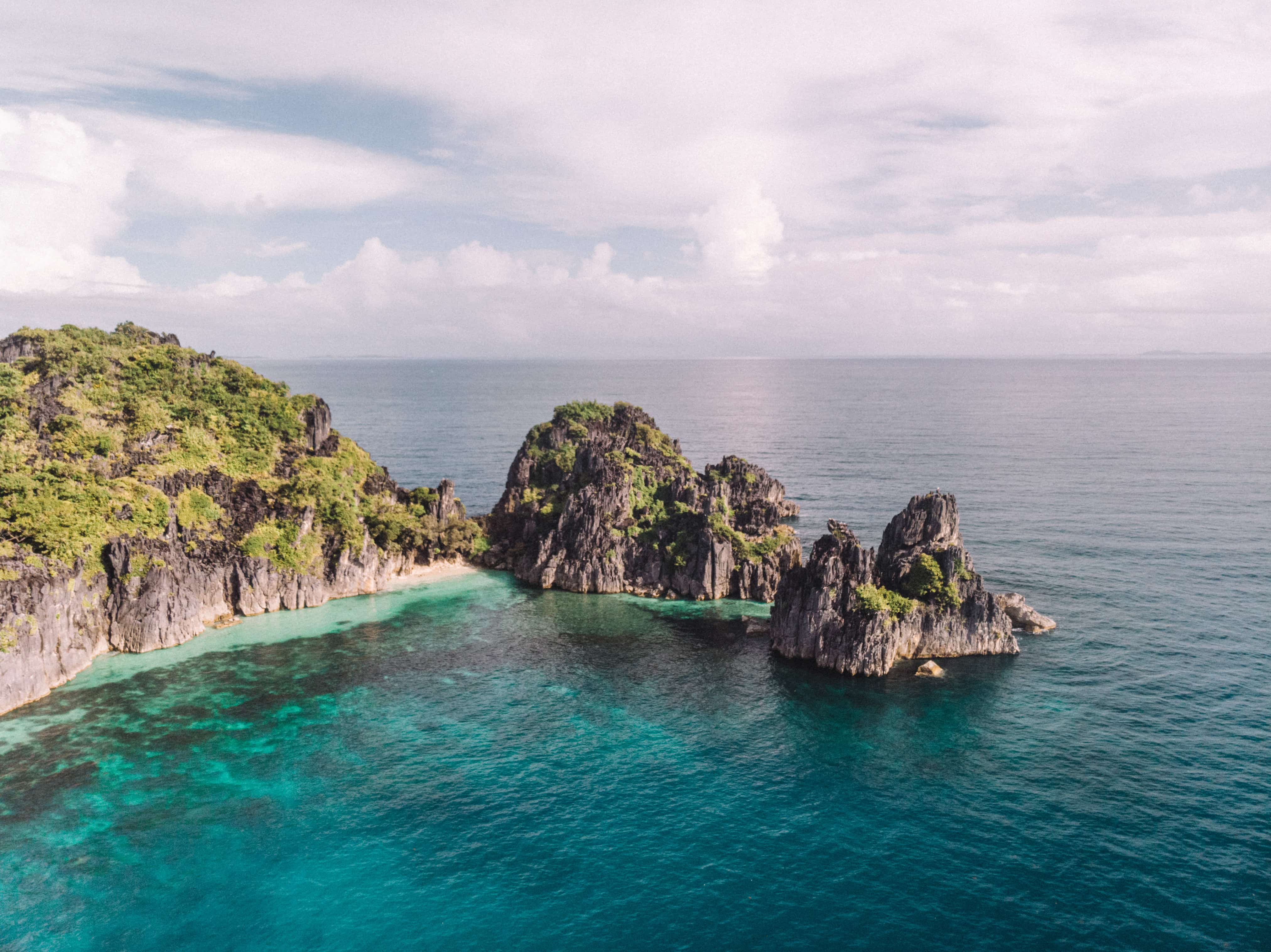 21 Amazing Caramoan Tourist Spots And Things to do in Caramoan 24 Caramoan tourist spots, Caramoan travel guide, Matukad Beach