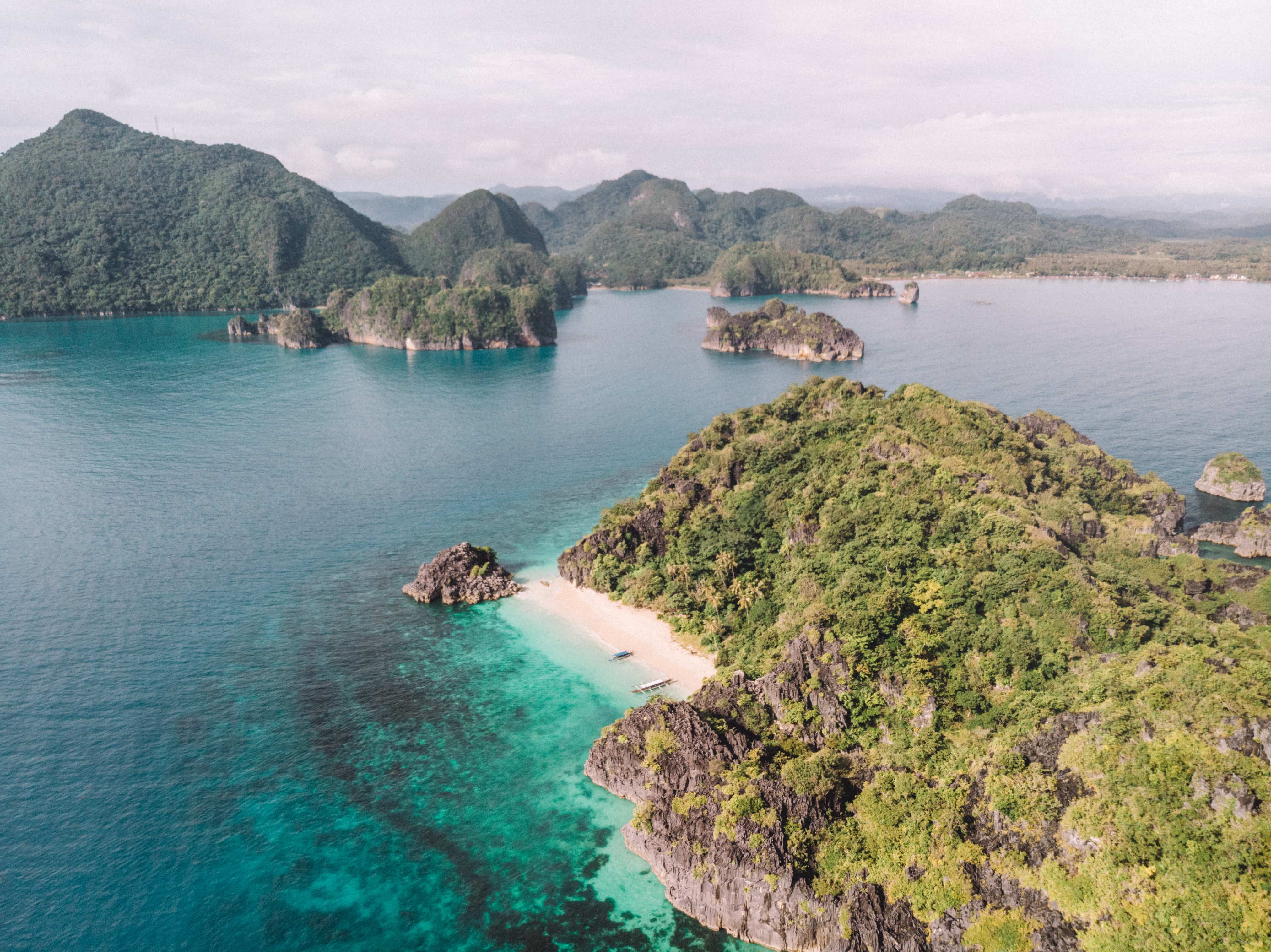 21 Amazing Caramoan Tourist Spots And Things to do in Caramoan 23 Caramoan tourist spots, Caramoan travel guide, Matukad Beach
