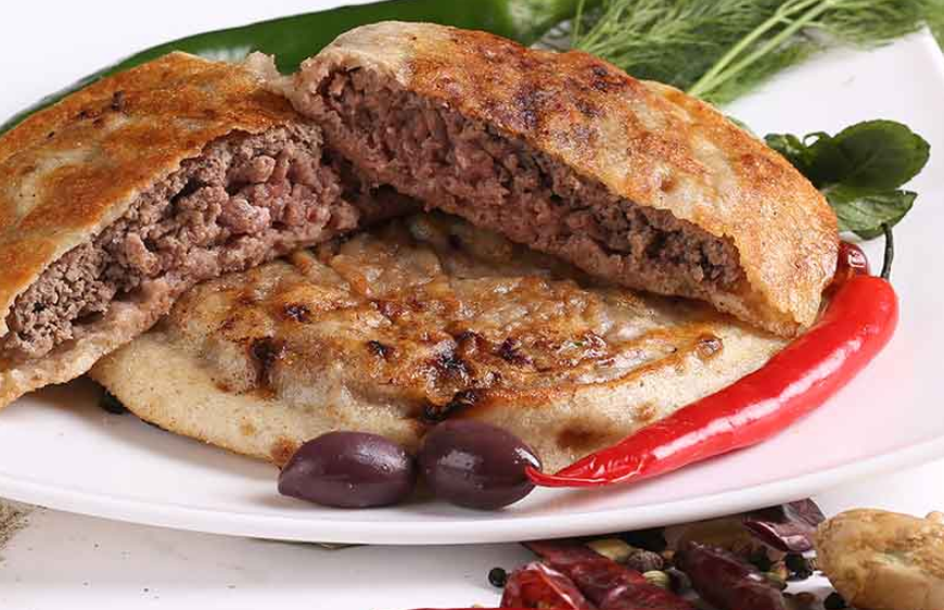 Best Egyptian Food - 57 Best Egyptian Dishes And Traditional Food in Egypt To Try 15 egyptian food, egyptian cuisine, egyptian dishes, egypt traditional food, food in egypt, Hawawshi
