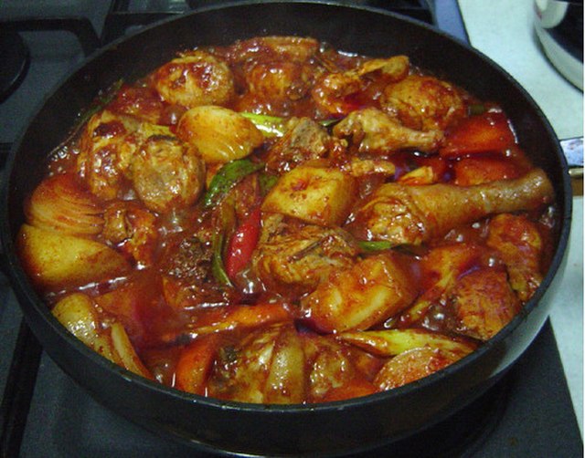 Best Dominican Republic Food: 50 Best Dominican Republic Dishes And Traditional Food in Dominican Republic To Try 13 Pollo guisado