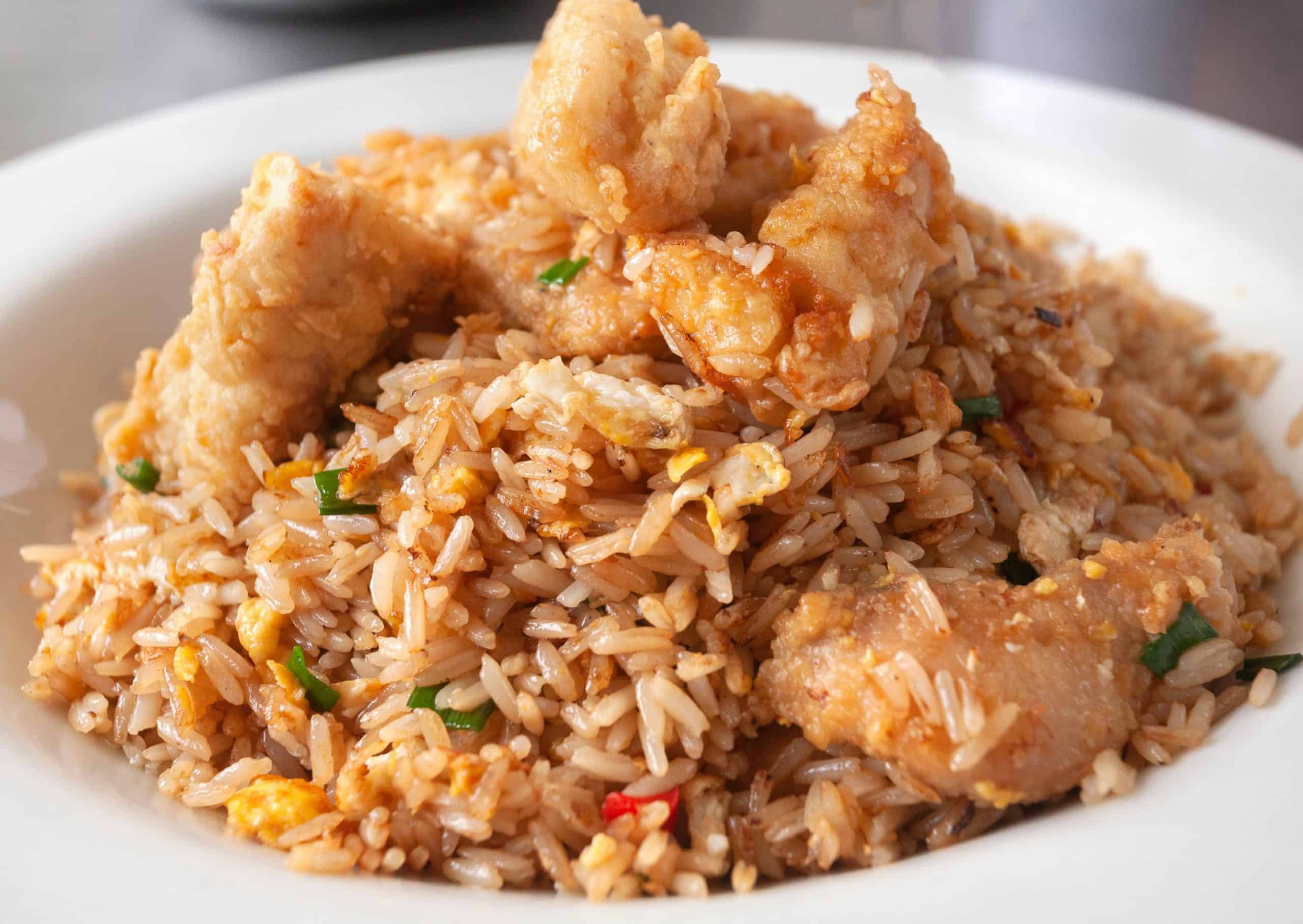 Comparison Lima vs Cusco - 10 Reasons to Pick the Best Peru Vacation For You 22 Arroz Chaufa Food in Peru Lima vs Cusco scaled