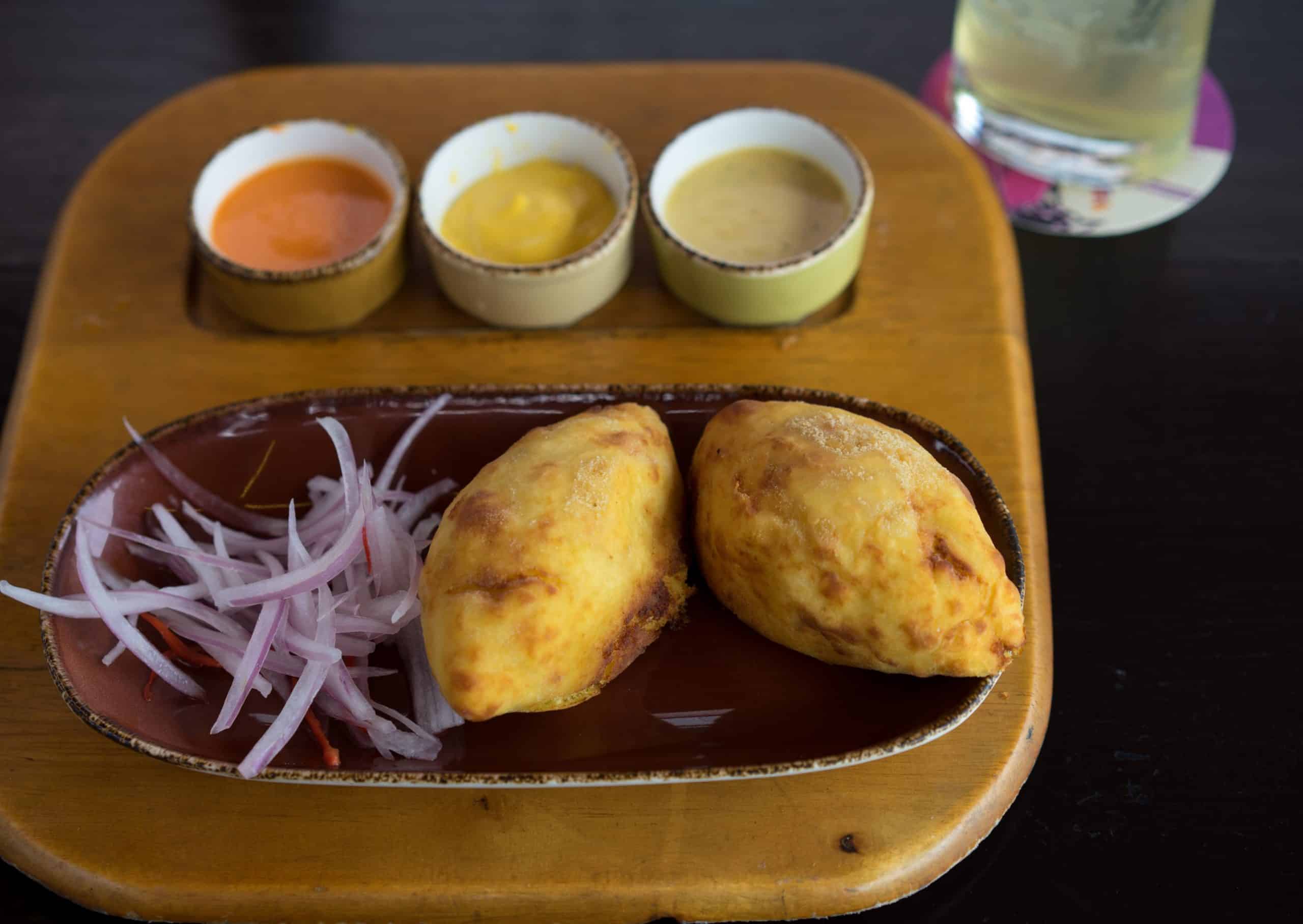 Comparison Lima vs Cusco - 10 Reasons to Pick the Best Peru Vacation For You 25 Empanadas Food in Peru Lima vs Cusco scaled