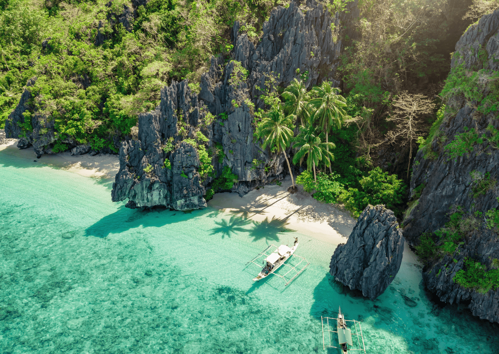 Comparison El Nido vs Coron - Which is the Better? 9 Entalula Island El Nido Gamintraveler