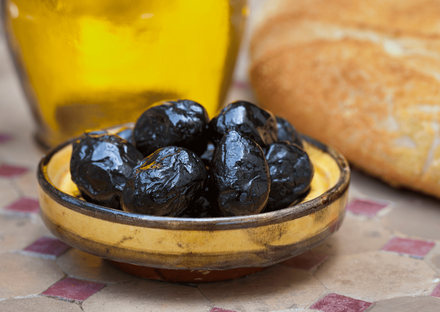 Typical Moroccan Breakfast Recipes: Best Breakfast in Morocco 8 dark Moroccan olives - Breakfast in Morocco, Breakfast in Morocco - 25 Traditional Moroccan Breakfast for You To Try When Visiting Morocco, typical moroccan breakfast, best breakfast in morocco, moroccan breakfast, breakfast in morocco, traditional moroccan breakfast, moroccan breakfast foods