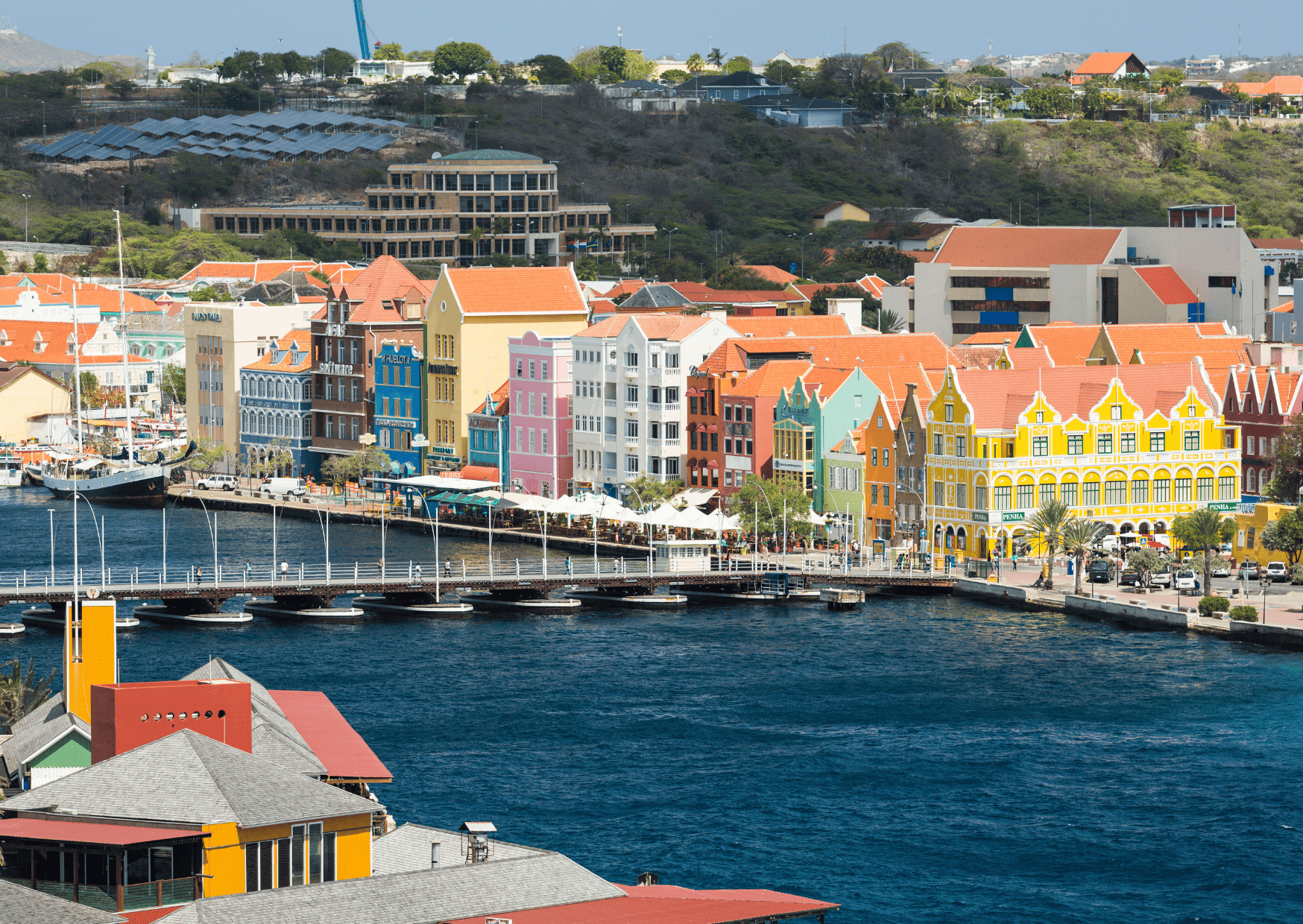 Comparison Aruba vs Curacao - Which is the Better Caribbean Trip? 31 Queen Emma Bridge in Curacao - Aruba vs Curacao