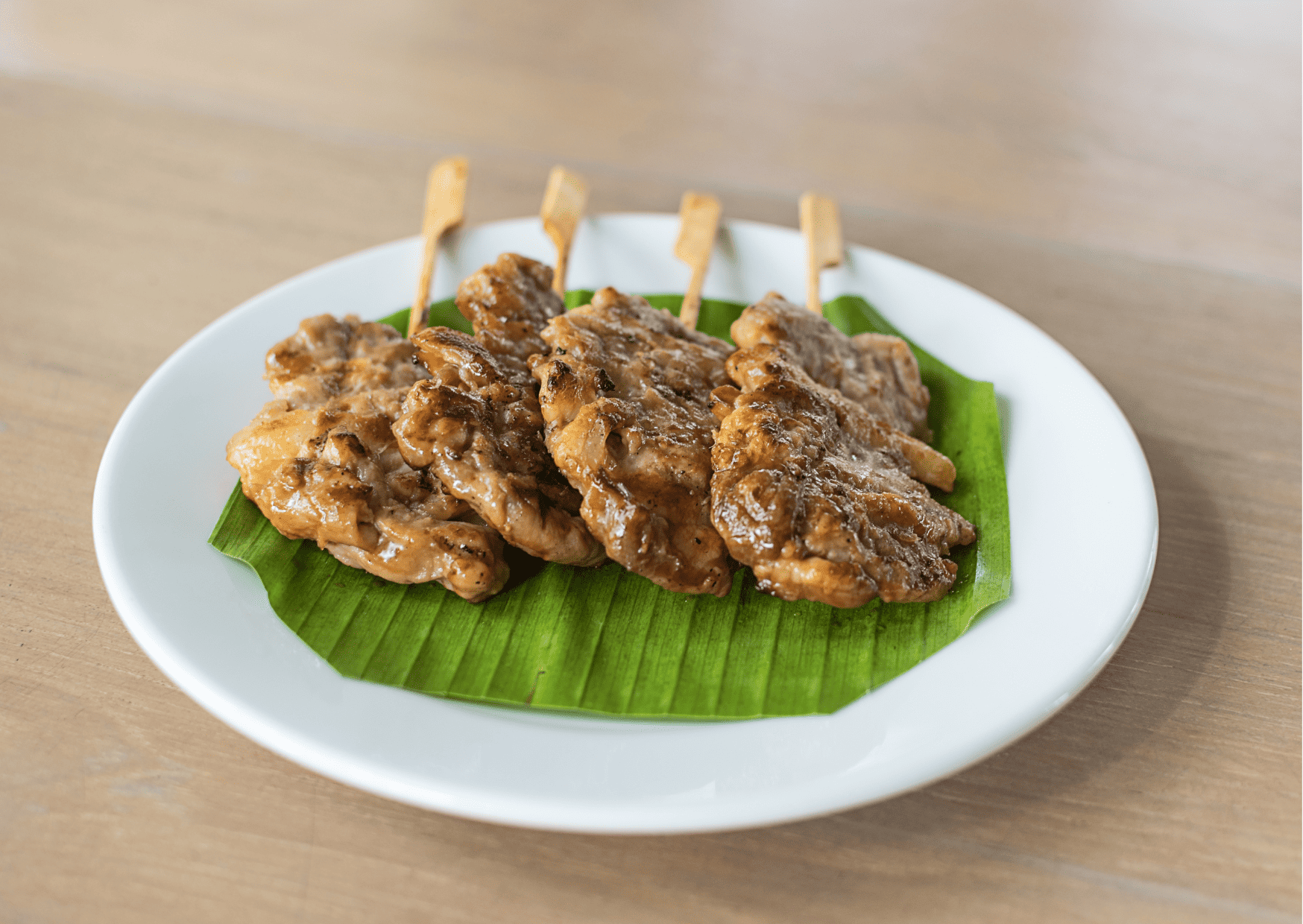Why Thai Breakfast Will Change the Way You Eat Mornings Forever (20 Dishes You’re Missing Out On) 4 Khao Niew Moo Ping, typical thai breakfast, Breakfast in Thailand, Thai breakfast food, traditional Thai breakfast food, Thai breakfast foods,
