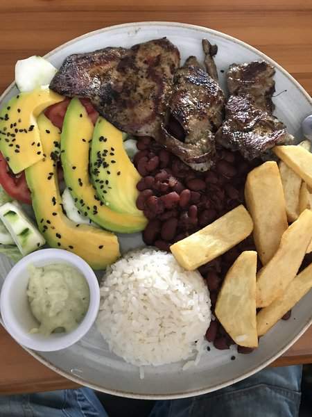 20 Things in Colombia That Confuse First-Time Visitors: What No One Explains Before You Visit Colombia 6 Bandeja Paixa, a popular dish in Colombia - Colombia vs Brazil