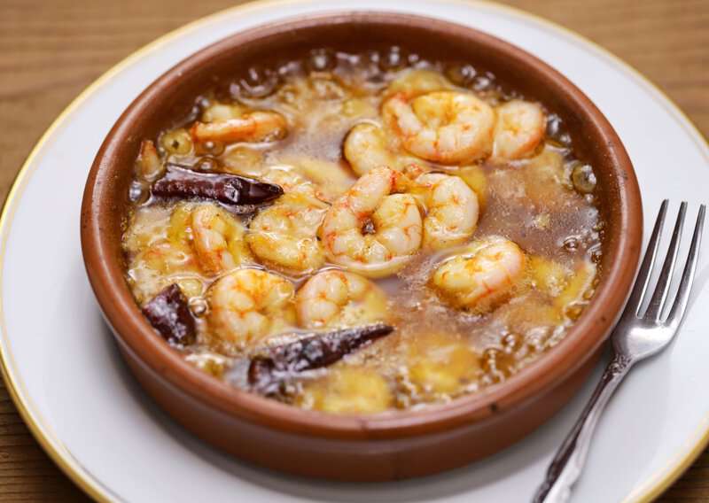9 Tapas Every Spanish Bar Serves And How to Make Them at Home 4 Spain For Foodies: What to Eat and Drink in Spain, Difference Between Gambas a l’Ajilo in Portugal Vs Gambas al Ajillo Spain (Recipe Guide), How to Eat in Spain Like a Local - 9 Tips To Eat As A Local When Visiting Spain, 15 Common Mistakes to Avoid in Europe and How to Avoid Them, How to Make Gambas al Ajillo - Authentic Gambas al Ajillo (Recipe Guide)