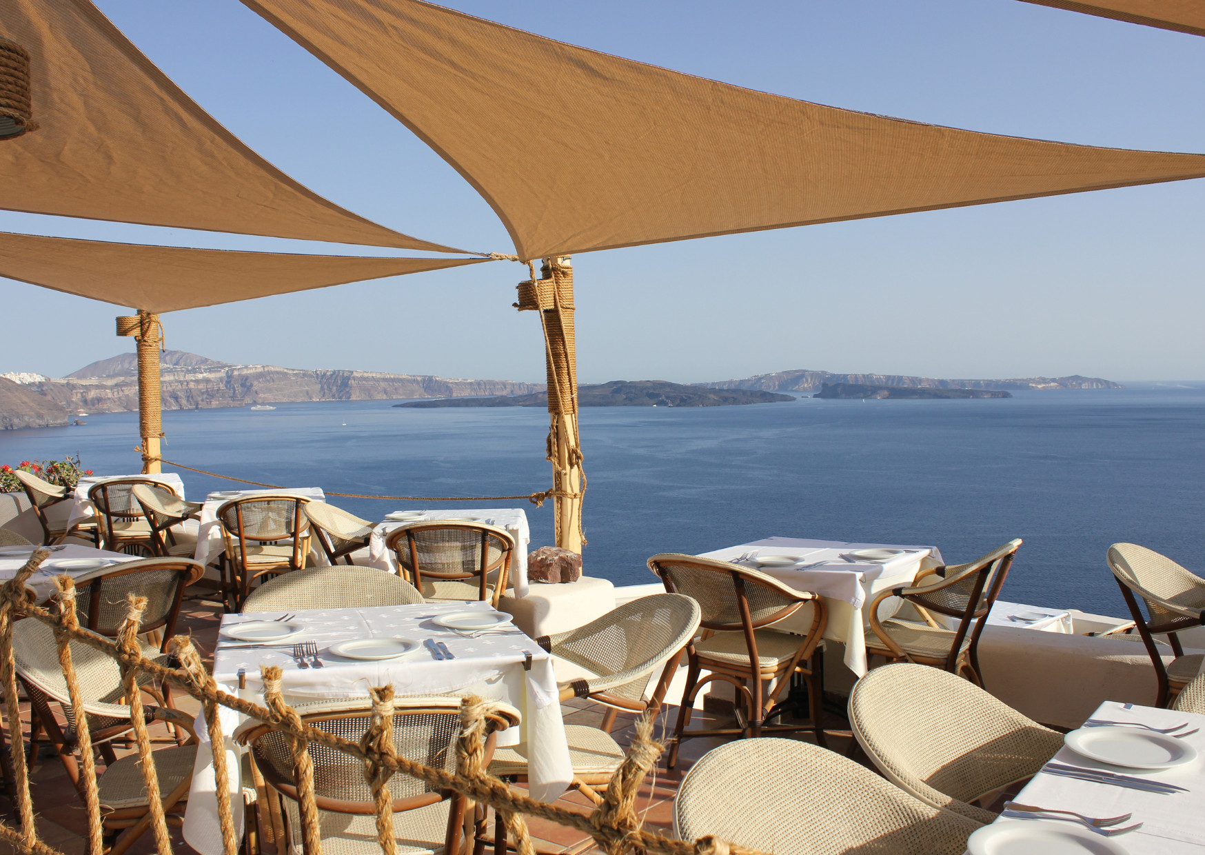 Avoid These 10 Biggest Mistakes Tourists Do in Santorini 4 Greek Restaurant with Santorini Beach View - Avoid These 10 Biggest Mistakes Tourists Do in Santorini