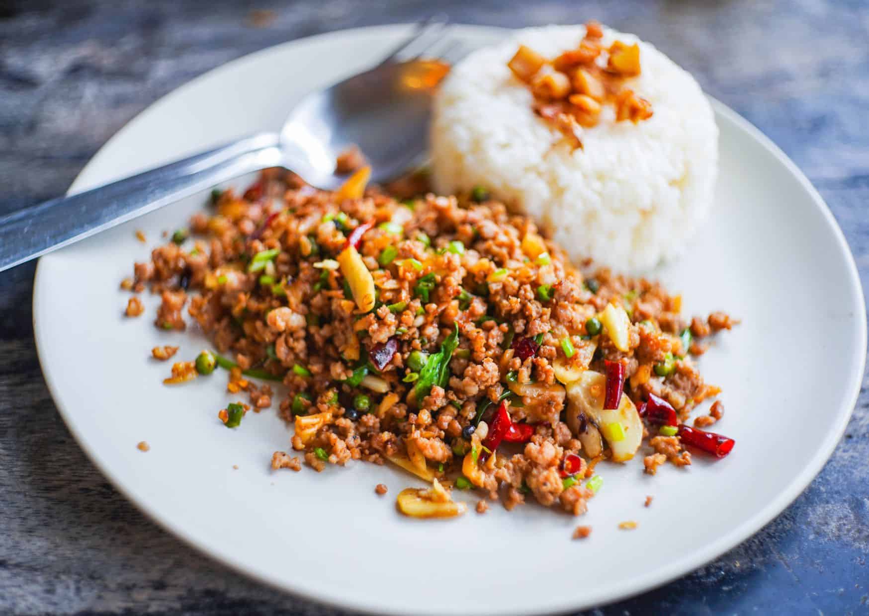 How Pad Kra Pao Is Actually Made in Thailand: This 20-Minute Thai Dinner Is Spicy, Garlicky And Addictive 1 How To Make Pad Kra Pao Moo (Recipe Guide) Tips And Calories