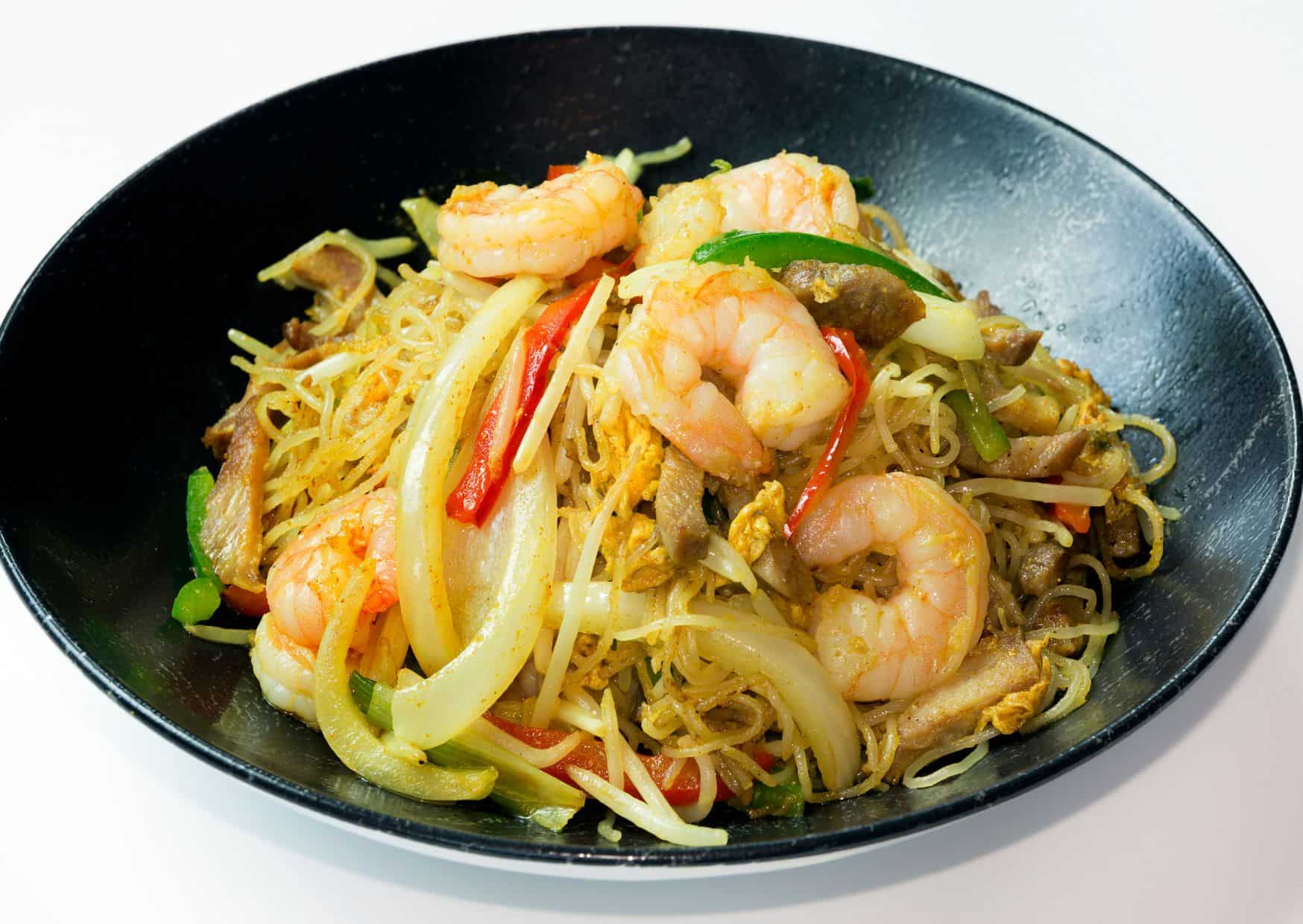 This 20-Minute Noodle Recipe Is Spicy, Savory, and Better Than Delivery: How to Make Perfect Singapore Noodles With Shrimp, Pork, and Vegetables 1 How To Make Singapore Noodles (Recipe Guide) Tips And Calories