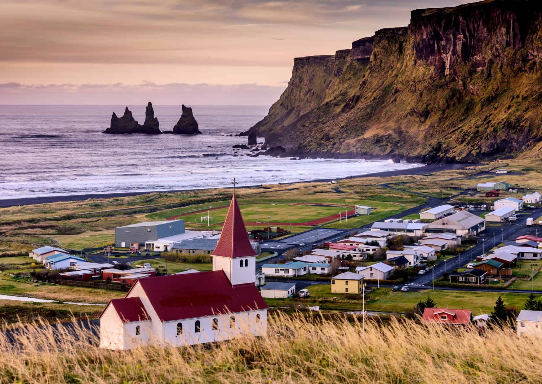 The Secrets of the World's Top 10 Happiest Countries Revealed 4 Happiest Countries in the World Vik Town Southern Iceland