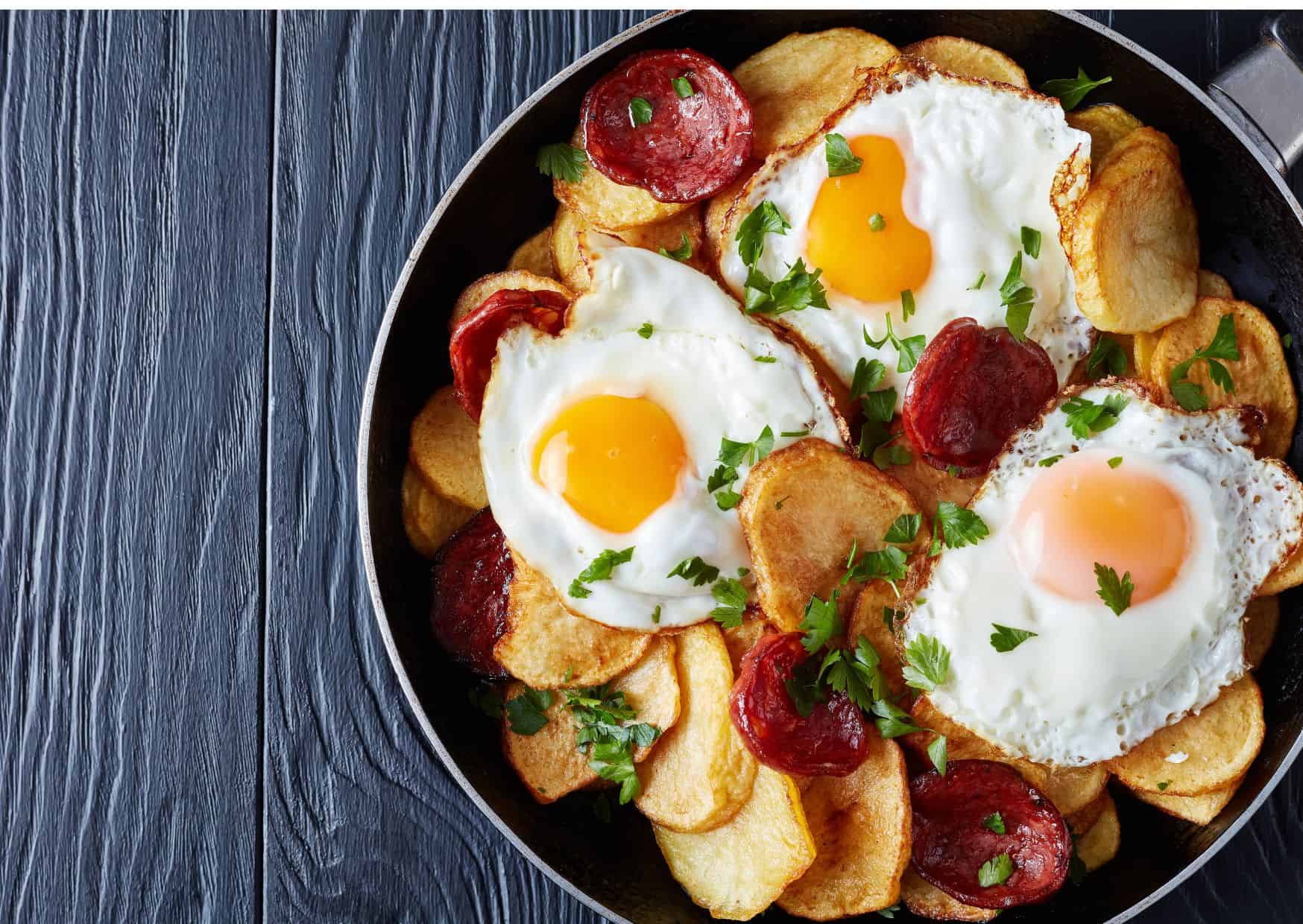 Americans Eat Bacon and Eggs And Spain Has Huevos Rotos: How to Make Spanish Broken Eggs With Ham Like a Madrid Tapas Bar 4 How To Make Spanish Broken Eggs With Ham (Recipe Guide)