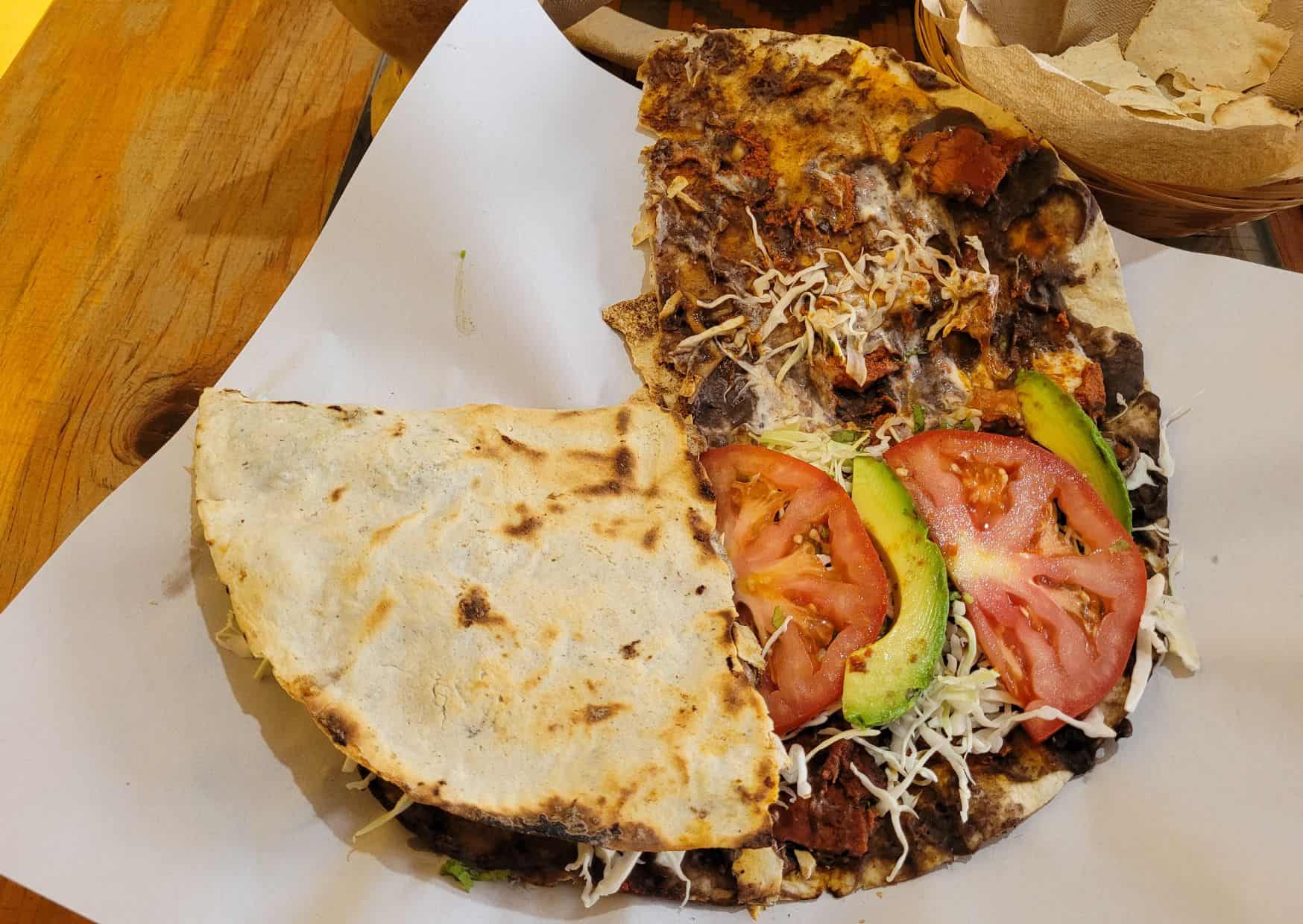 Why Tlayudas Are Called Mexican Pizza But Taste Nothing Like It: How To Make Authentic Oaxacan Tlayudas At Home 4 Most Popular Foods In Mexico: How To Make Tlayudas (Recipe Guide)