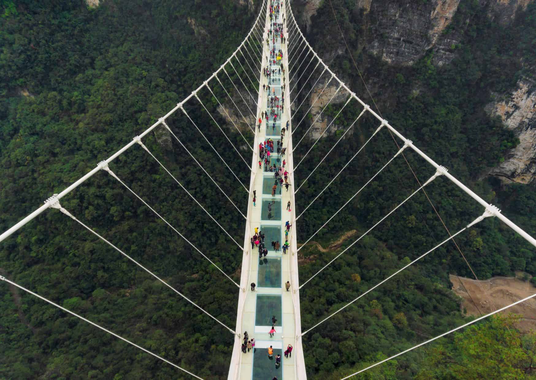 18 Hidden Places Around the World That Feel Fake (But Aren’t) 4 Glass Bridge over Zhangjiajie Grand Canyon
