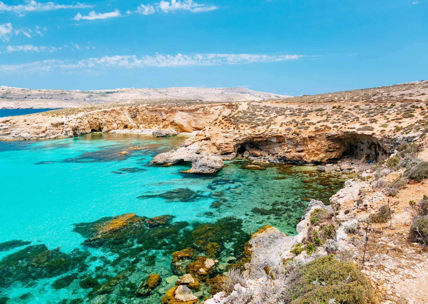 Want a New Passport? 15 Countries Where You Can Literally Buy a Second Citizenship 8 Comino Blue Lagoon Malta 13 ‘Secret Offbeat European Beaches Youd Swear Are in the Caribbean