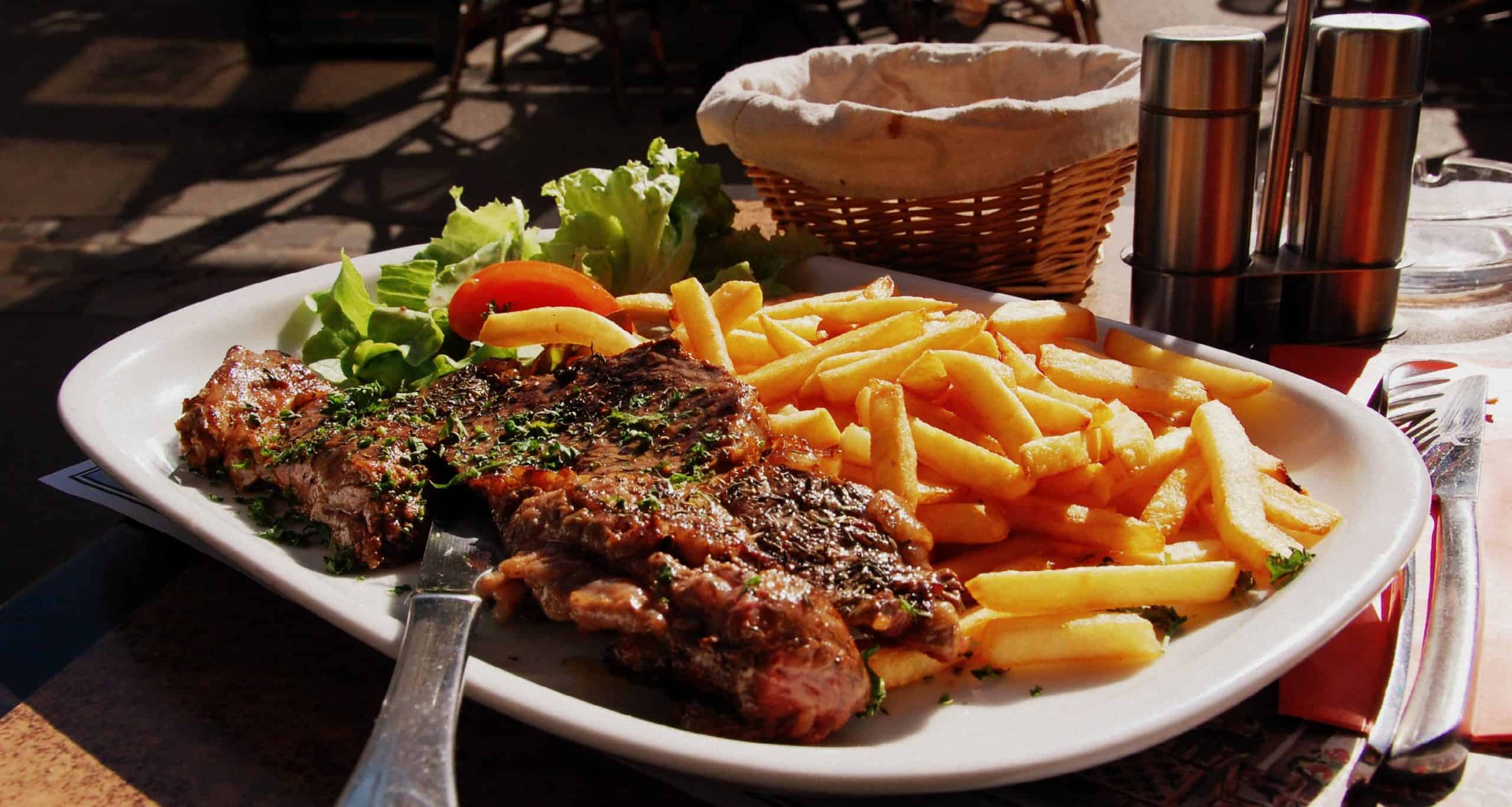 10 Things French People Actually Eat Every Day And It’s Not What Americans Expect 4 Steak frites France scaled