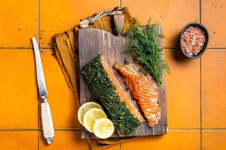 Why Mediterranean People Eat So Healthy: The Foods Mediterranean People Barely Eat That Americans Consider Normal 3 scandinavian gravlax salmon fillet with dill salt papper orange background top view 89816 43397