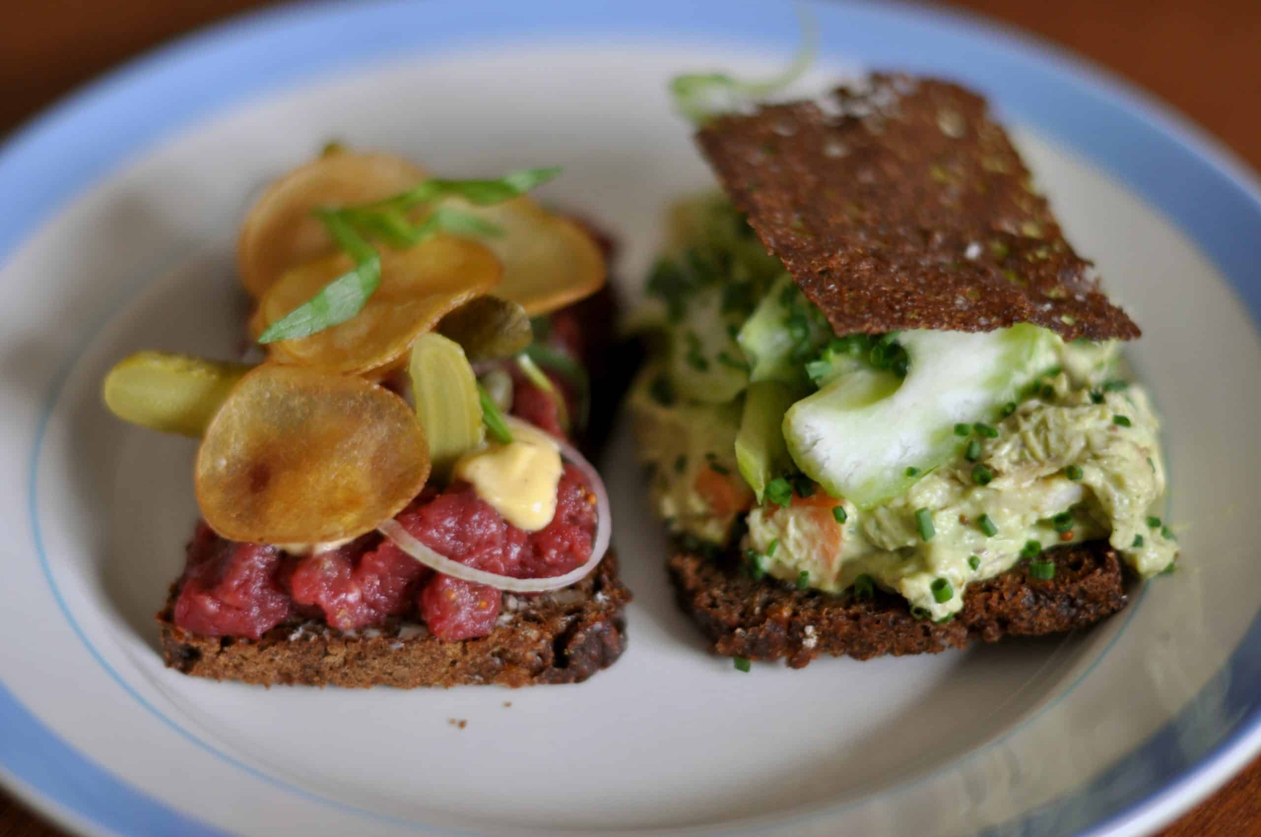 7 Ways Scandinavians Out-Eat Americans in Mornings 2 Smorrebrod med tatar og honsesalat 5485563164 scaled