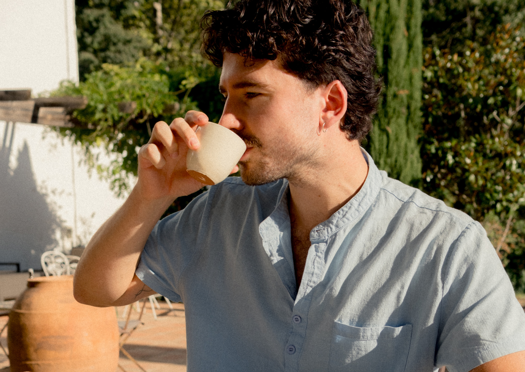 greek drinking coffee