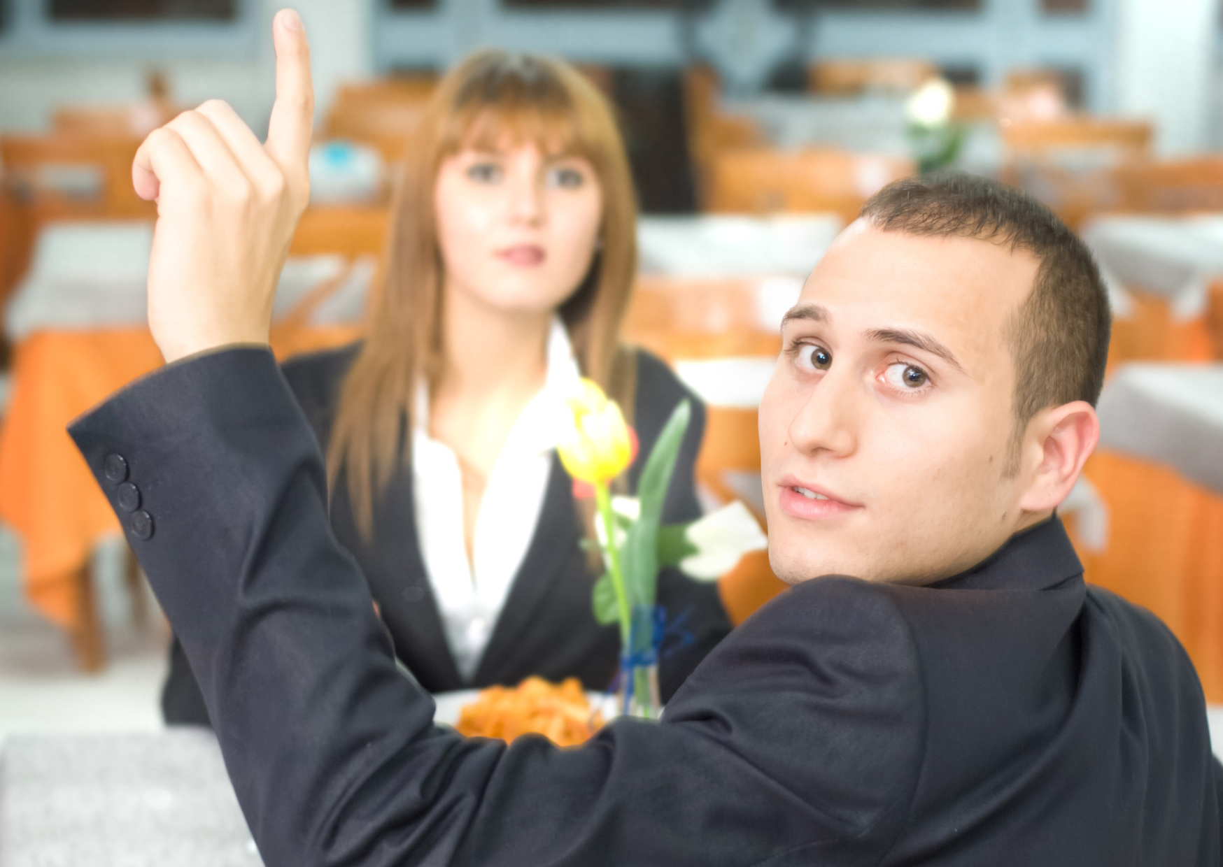 The Hand Gesture In Barcelona That Gets American Tourists Ignored For An Hour: Americans Wave for Service. Barcelona Waiters May Pretend They Didn’t See It 1 finger snapped in restaurant 2